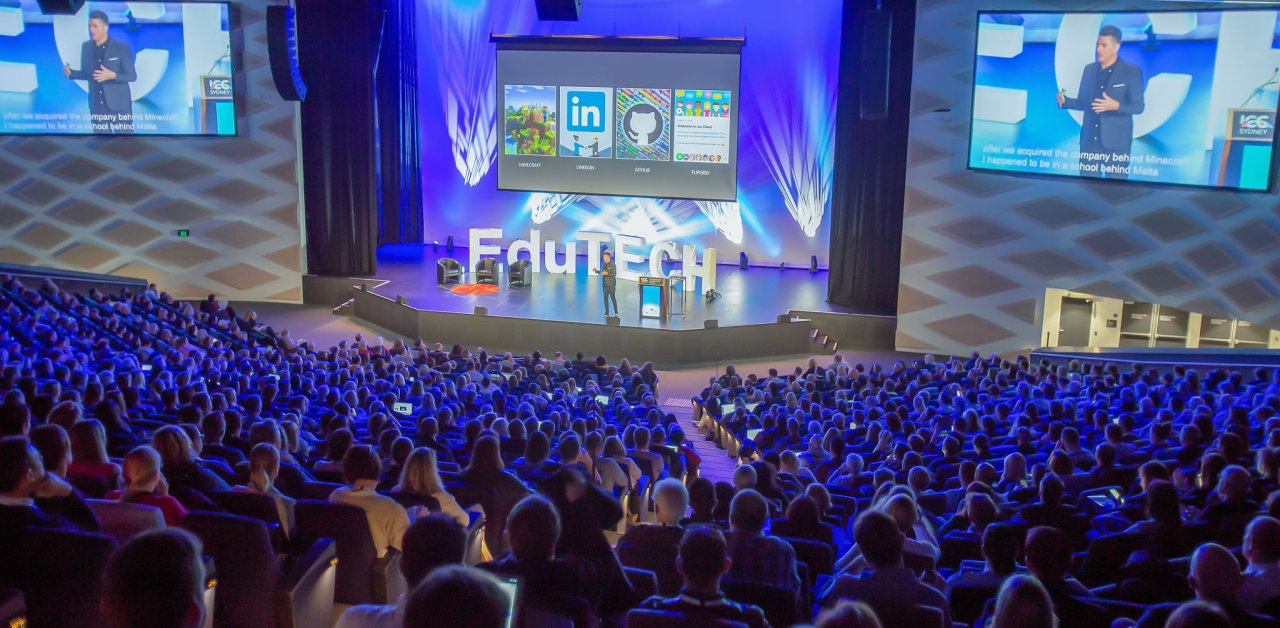 Someone speaking at EduTech.